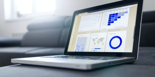 Dashboard on laptop showing lead scoring data