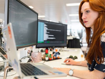 woman working at computer with predictive lead scoring