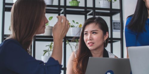 People discussing sales process troubleshooting